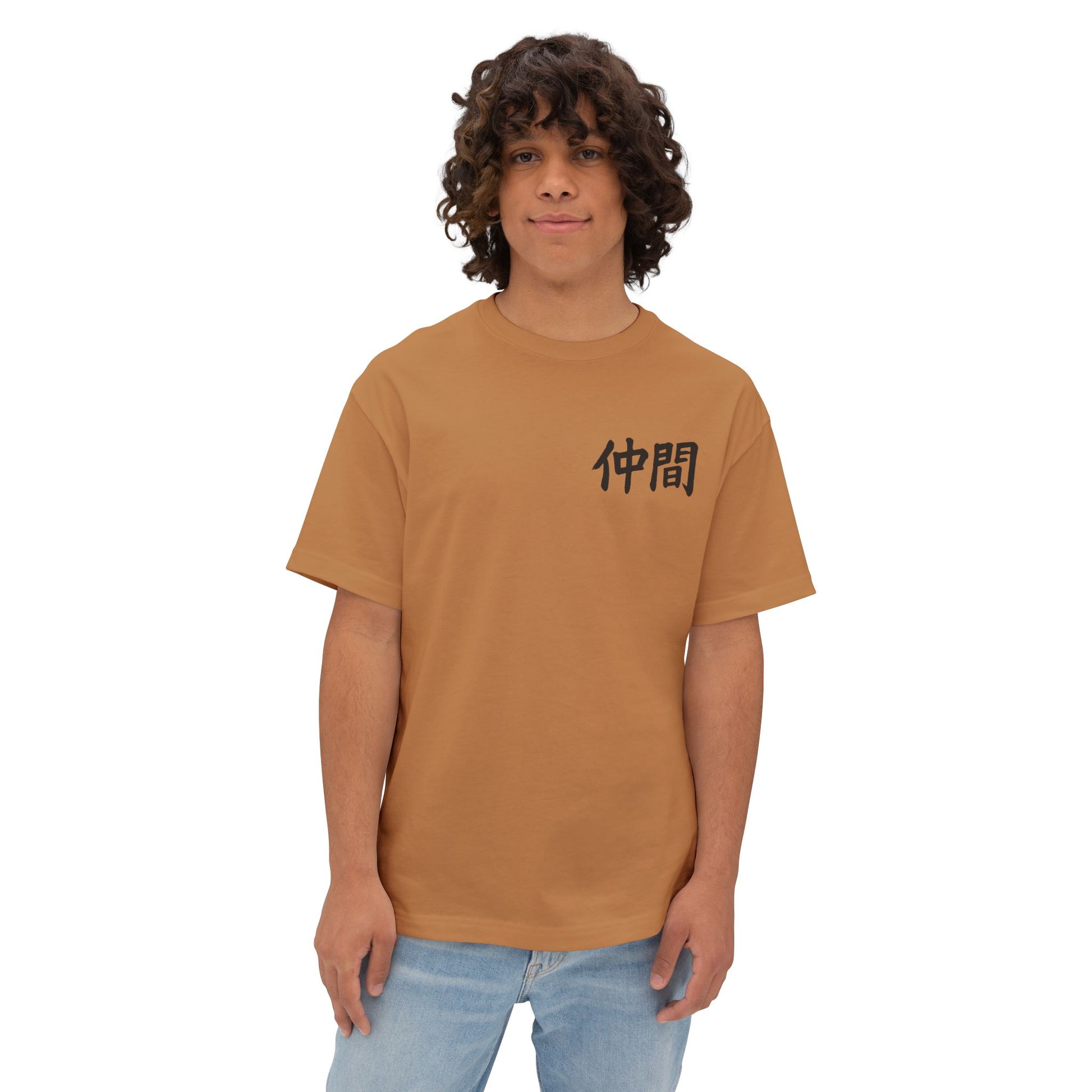 Person wearing a brown Nakama t-shirt with black Japanese text on a white background