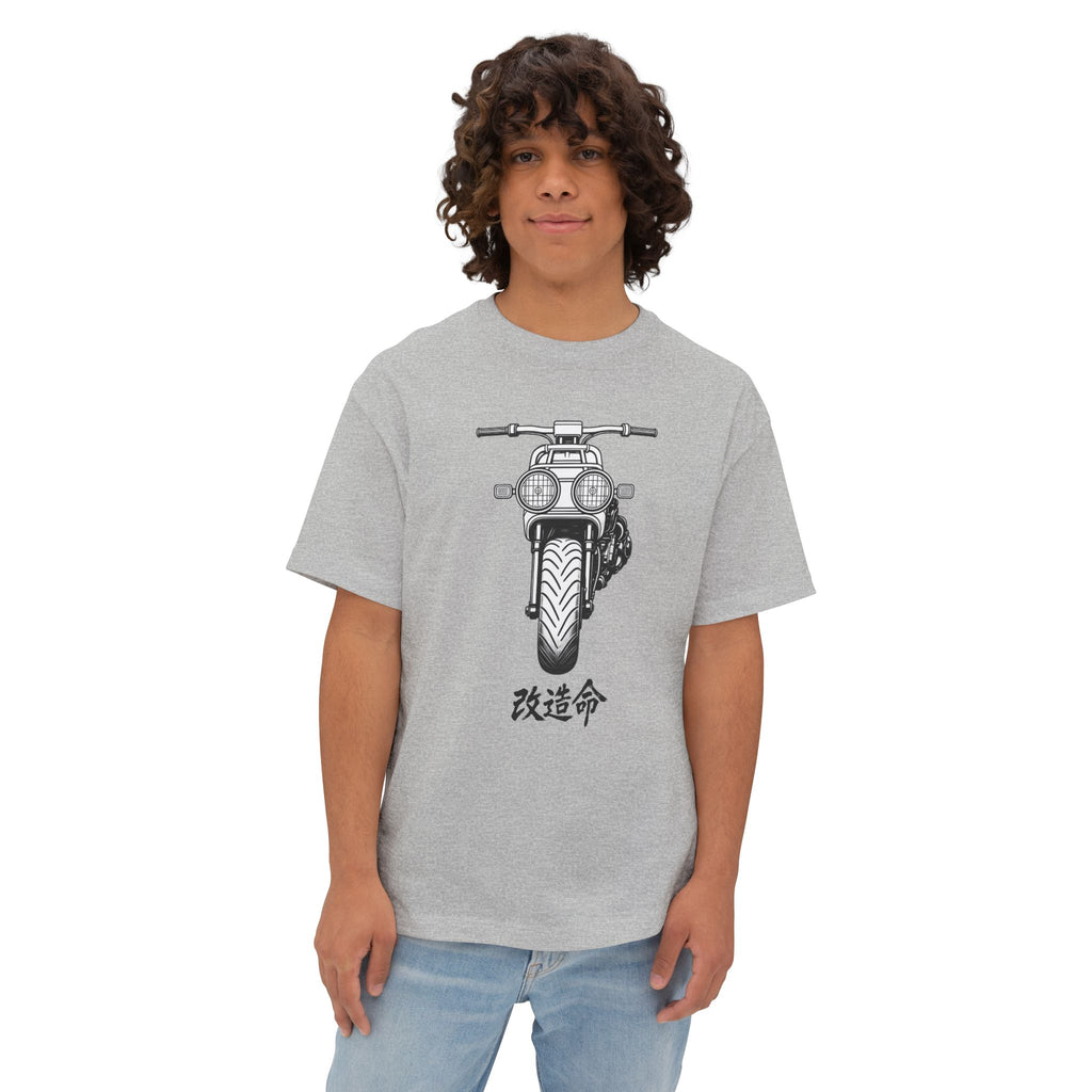 Person wearing a gray t-shirt with a Honda Ruckus graphic and Japanese text on a white background