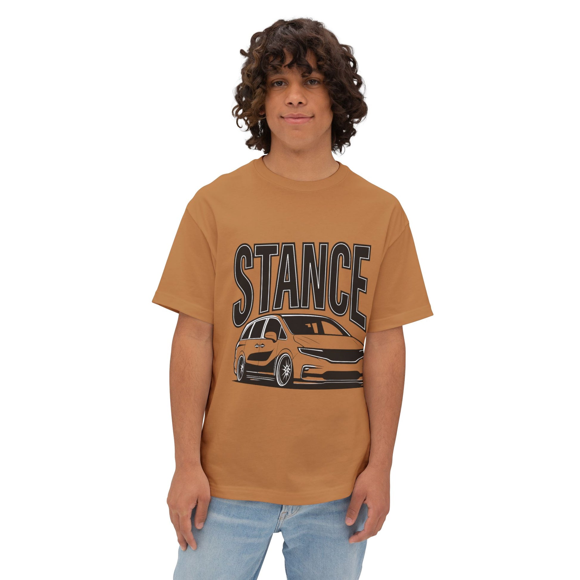 Person wearing a Brown 'STANCE' t-shirt with a slammed Honda Odyssey design 