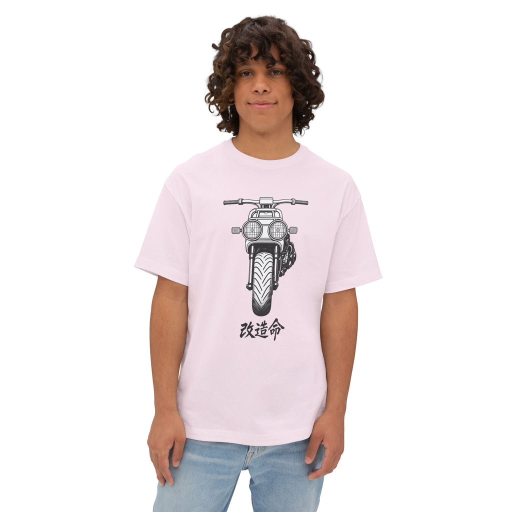 Person wearing a light pink t-shirt with a Honda Ruckus graphic and Japanese text on a white background