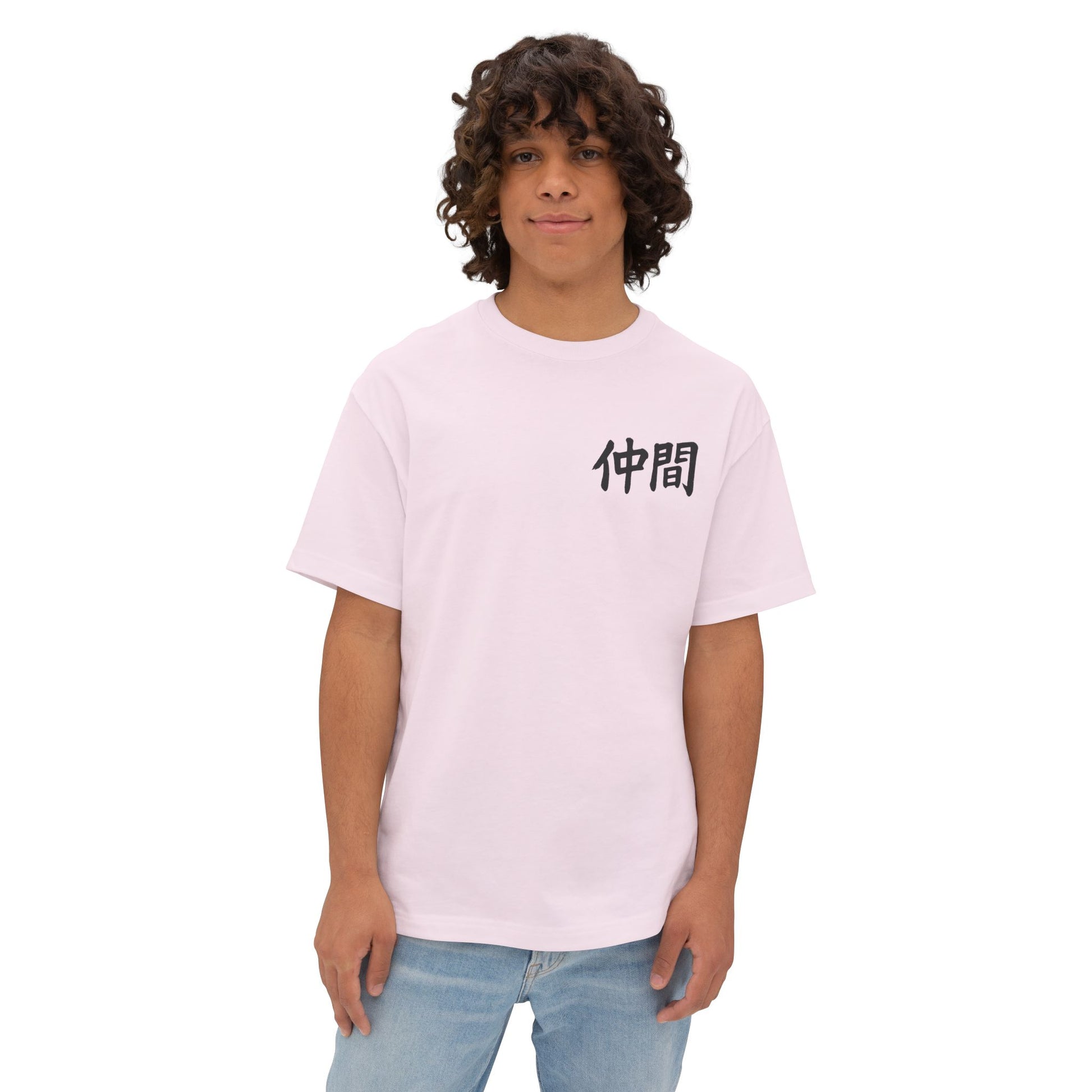 Person wearing a light pink Nakama t-shirt with black Japanese text on a white background