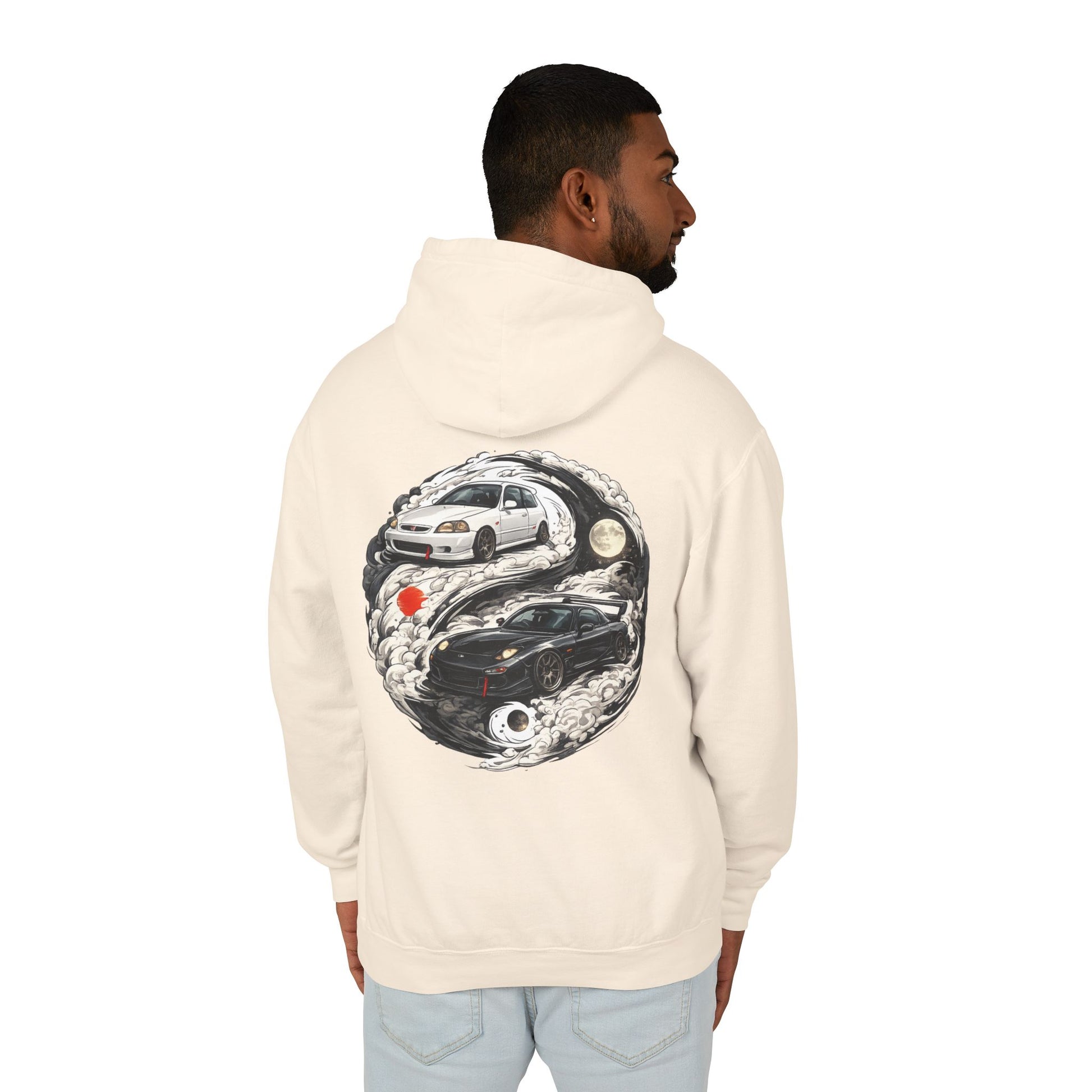 Man wearing a cream hoodie with a car graphic on the back against a white background